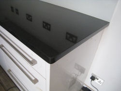 Black Granite Kitchens Worktops London with Glass Splashbacks