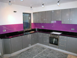 Black Granite Worktops and Glass Splashbacks in Hampstead