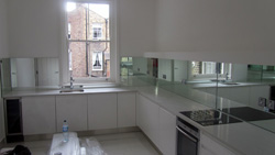 Quartz kitchen worktops and mirror glass splashbacks Fulham