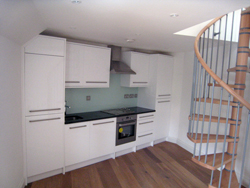 West Norwood black granite worktops / glass splashbacks